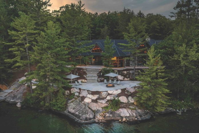 Luxury cottage in Muskoka woods by the lake designed by Gilbert Burke