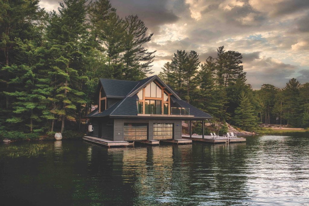 Luxury cottage in Muskoka woods by the lake designed by Gilbert Burke