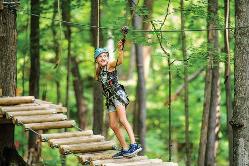Young girl at a zipline in Horseshoe Resort, Ontario, Canada